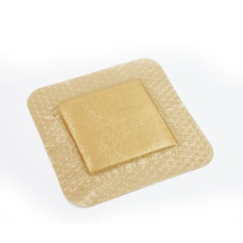 Pansement en mousse avec bordure adhésive